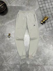 Спортивні штани Adidas сірі